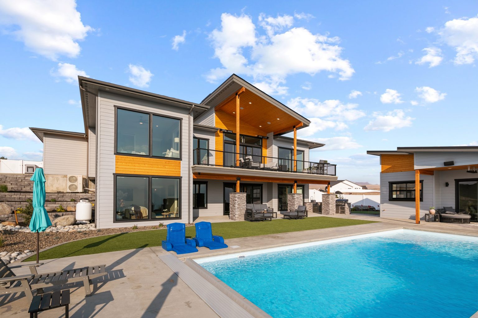 Contemporary home with backyard pool and covered patio on the Wenatchee Home Tour